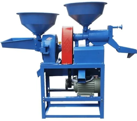 Portable automatic mini rice mill with a compact steel body and discharge chute